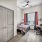 Large well lit bedroom with plush carpets and large windows 