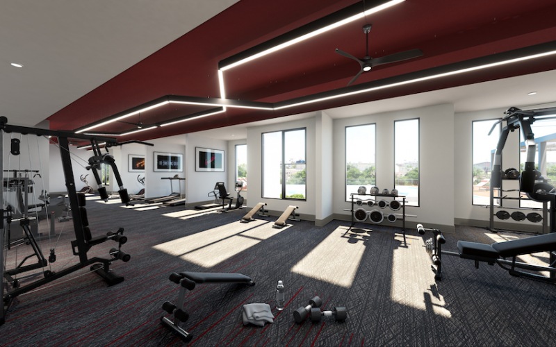 rendering of fitness center with modern lighting and open spaces